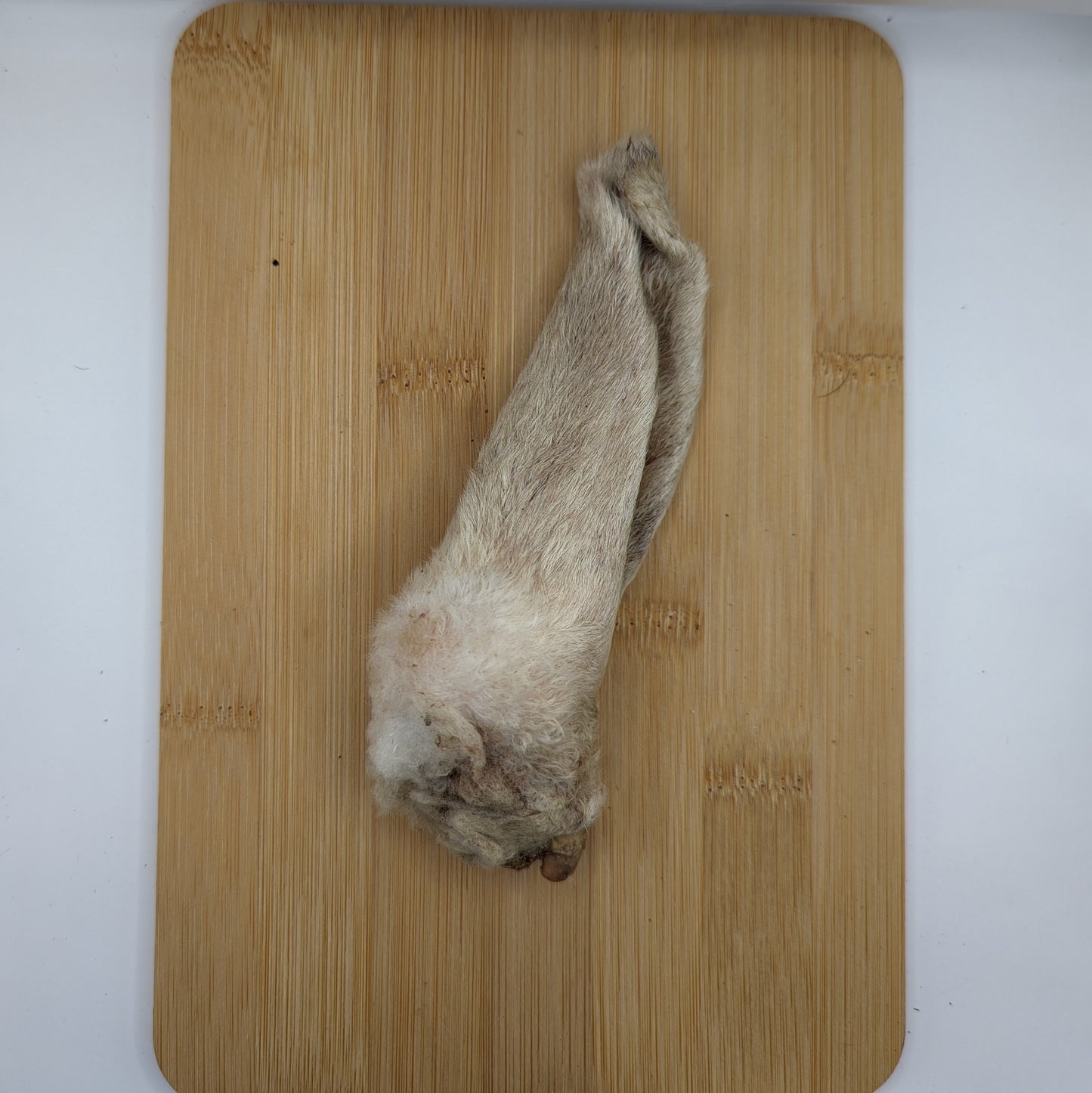 A Wooly Sheep Ear from Beast Feast on a cutting board.