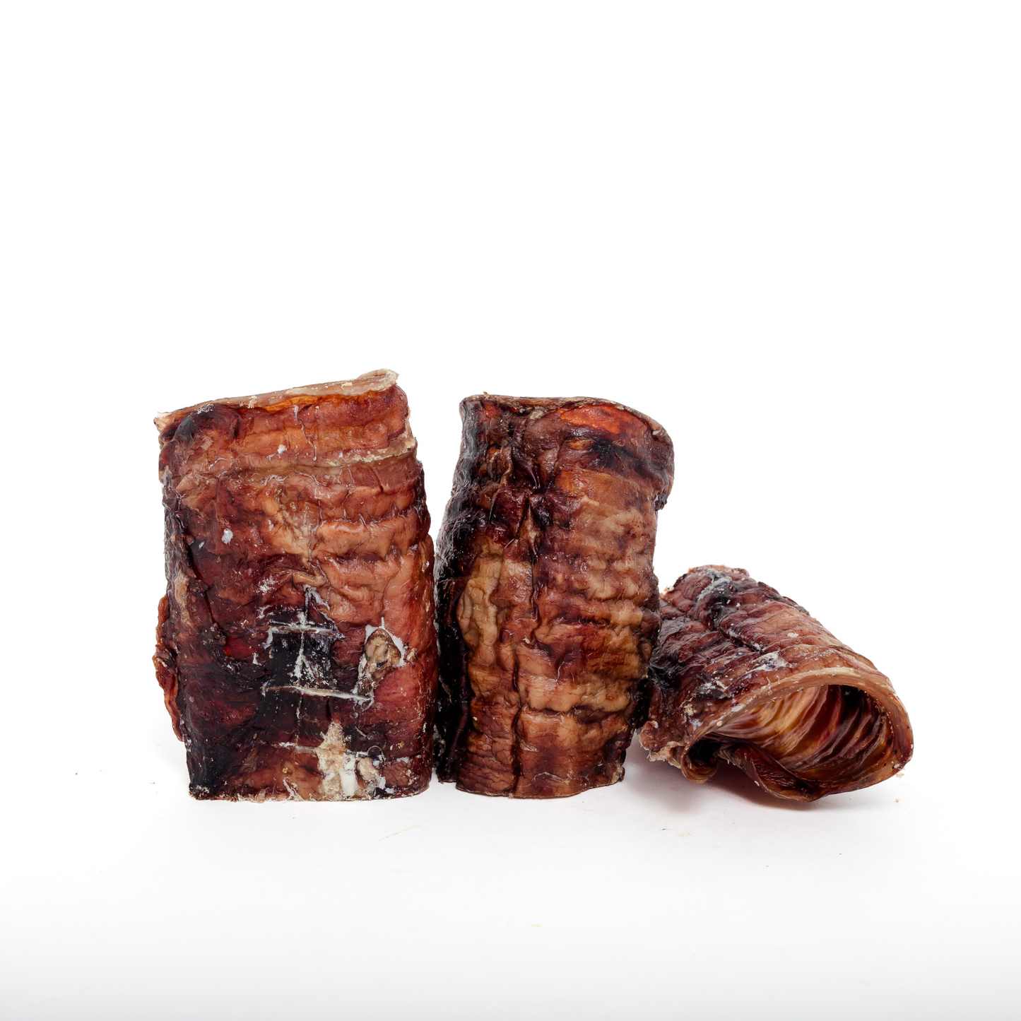 Three Wild Nosh Pets Bison Half Trachea chews are displayed on a white background, providing your pup with a natural source of glucosamine.