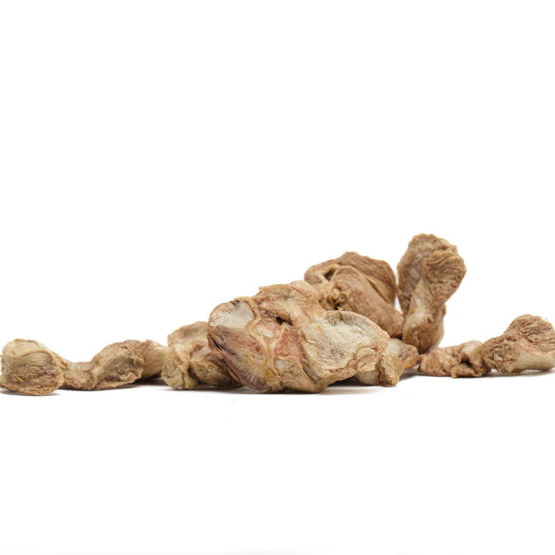 A cluster of dried, light brown roots with a rugged texture and twisted shapes is displayed against a plain white background, resembling the natural intricacy found in Freeze-Dried Chicken Gizzards 3oz by Wild Nosh Pets.