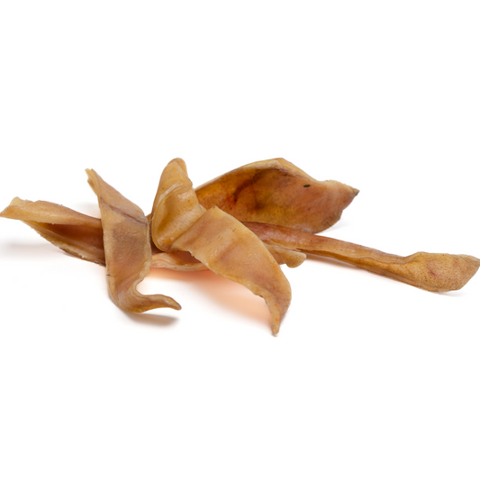 Wild Nosh Pets Heritage Breed Dehydrated Pig Ear Strips against a white background, offering a softer chew for dogs with added glucosamine and chondroitin.