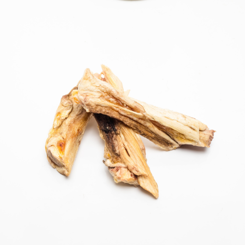 Three dried root pieces arranged on a white background, reminiscent of the Wild Nosh Pets Freeze-Dried Bison Achilles Tendon enjoyed by senior dogs.